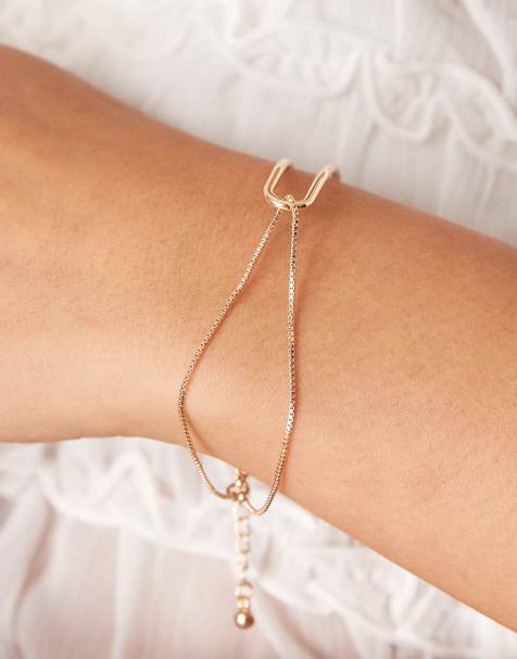 Pulsera dorada con diseño rígido delicado y detalle de cadena de ASOS DESIGN - view 1