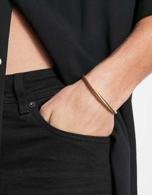 Pulsera dorada con diseño slim de Faded Future