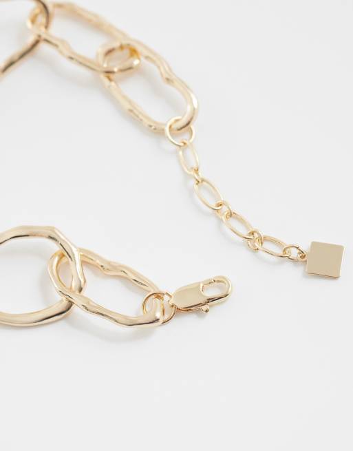 Pulsera dorada de cadena con eslabones efecto fundido de ASOS DESIGN, 2 de 3