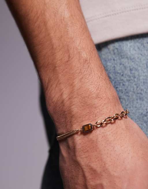 Pulsera dorada estilo cadena con piedra semipreciosa de ojo de tigre de ASOS DESIGN