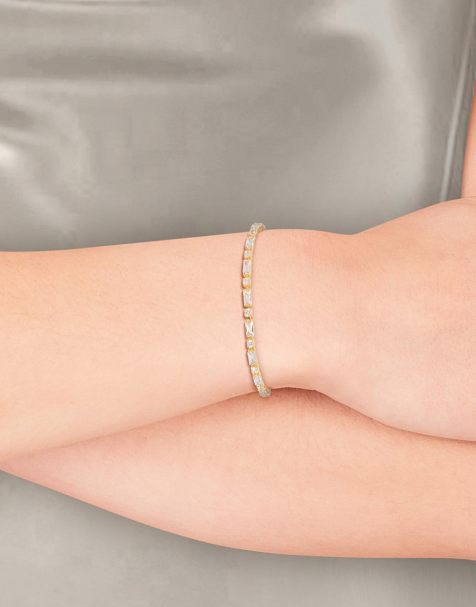 Pulsera dorada estilo tenista ajustable con diseño de piedras de corte baguette chapada en oro de Lovisa - view 1