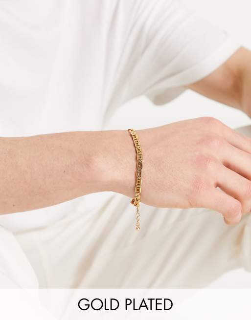 Pulsera estilo cadena con aberturas chapada en oro de 14 quilates de ASOS DESIGN