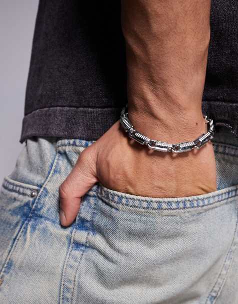 Pulsera gruesa plateada con detalles en relieve de acero inoxidable resistente al agua de ASOS DESIGN - view 1