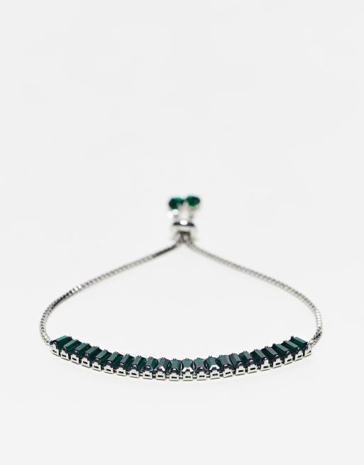 Pulsera plateada con diseño ajustable y cristales verdes de talla baguette de River Island