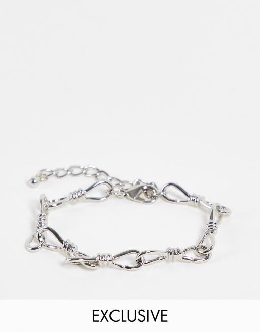Pulsera plateada de eslabones con púas de Faded Future