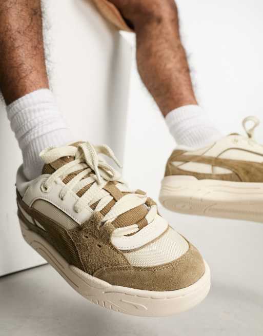 White and cheap brown pumas