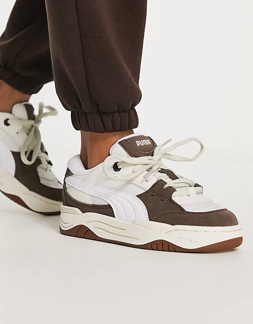 PUMA 180 sneakers in chalk and brown with gum sole