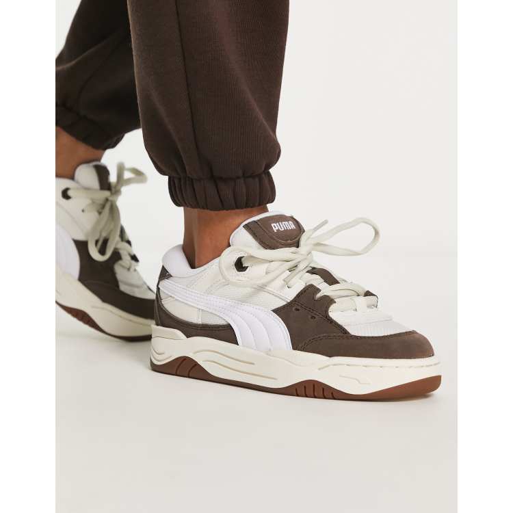 PUMA 180 sneakers in chalk and brown with gum sole | ASOS