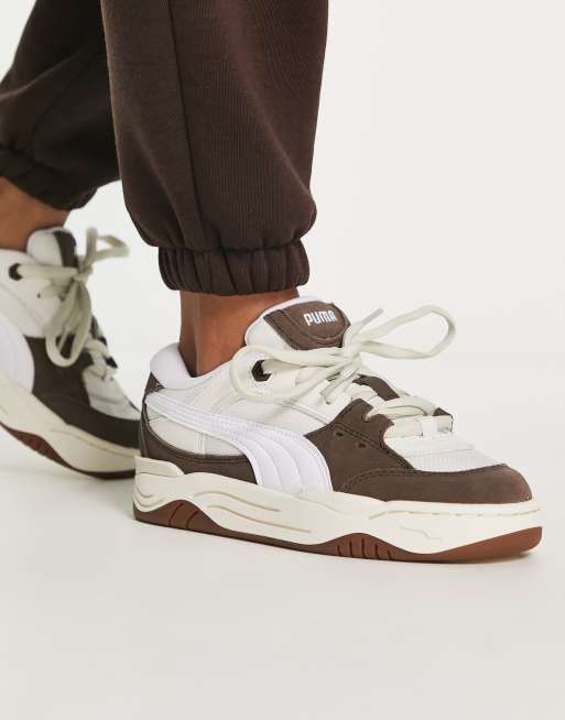 PUMA 180 sneakers in chalk and brown with gum sole | ASOS