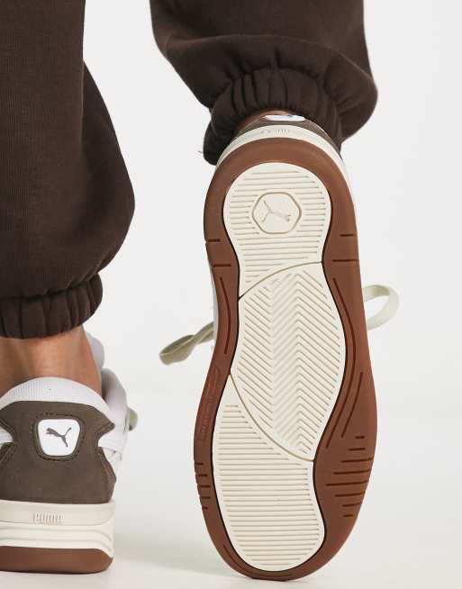 PUMA 180 sneakers in chalk and brown with rubber sole