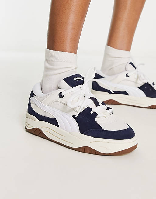 PUMA 180 sneakers in chalk and navy with gum sole | ASOS
