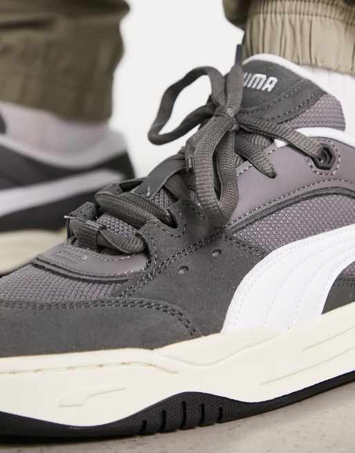 Puma 180 sneakers in dark gray with white detail | ASOS