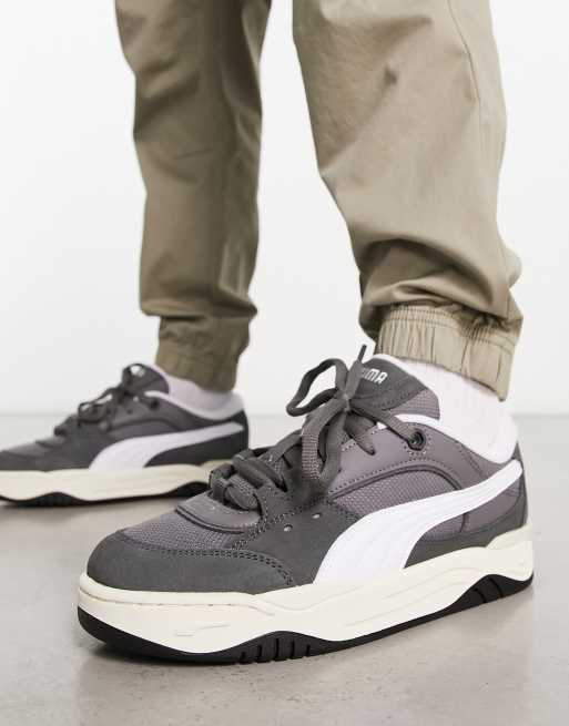 Puma 180 sneakers dark gray with white detail | ASOS