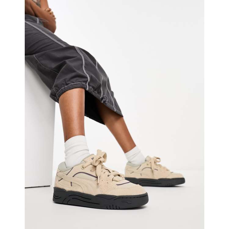 PUMA 180-Tones sneakers in beige and black