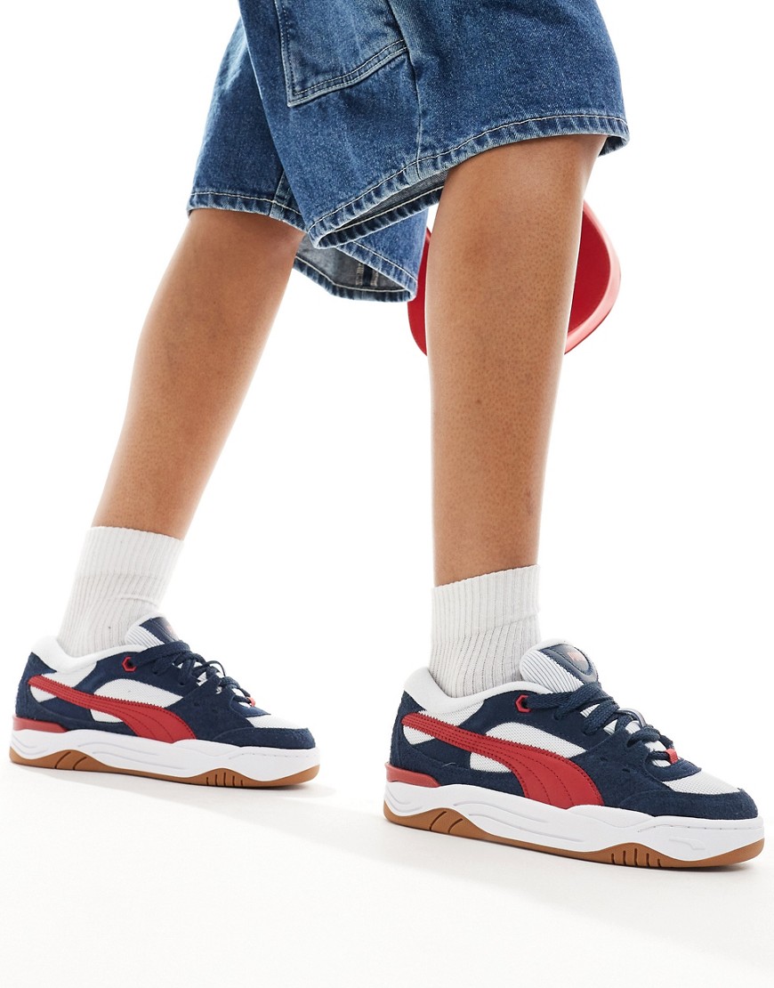 Puma 180 trainers in navy and red