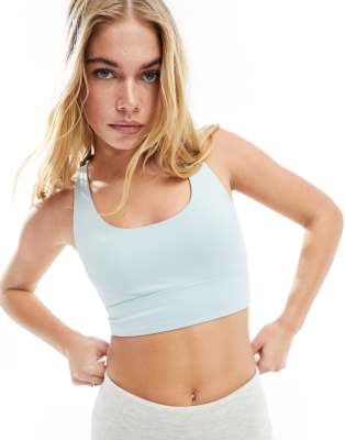 Puma 4keeps evolve training longline bra in turquoise surf - ASOS Price Checker