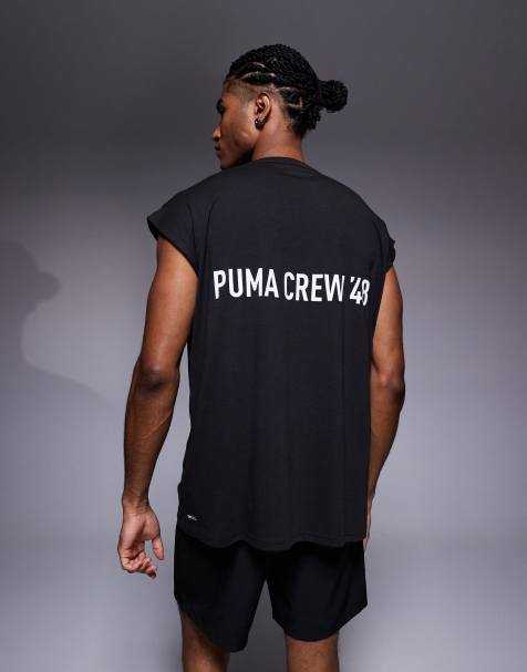 PUMA - Afgeknipte tanktop met grafische print op de achterkant in zwart - view 1