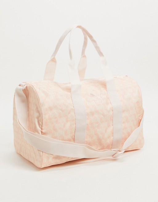 Puma all over print small holdall in pink