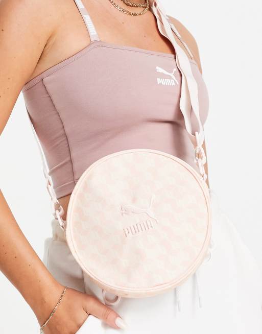 Puma AOP Round backpack in pink and white