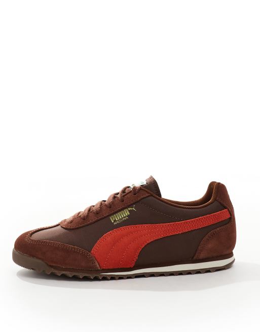 PUMA Arizona Nylon Sneakers in bruin en rood ASOS
