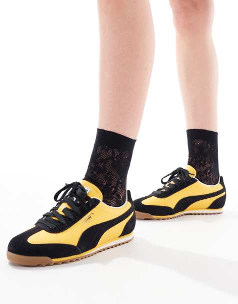 PUMA – Arizona – Sneaker in Gelb & Schwarz - view 1