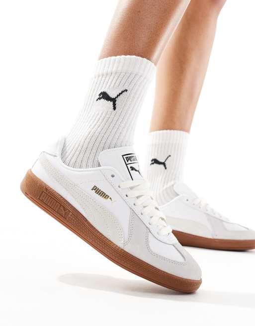 Puma bianche con suola marrone hot sale