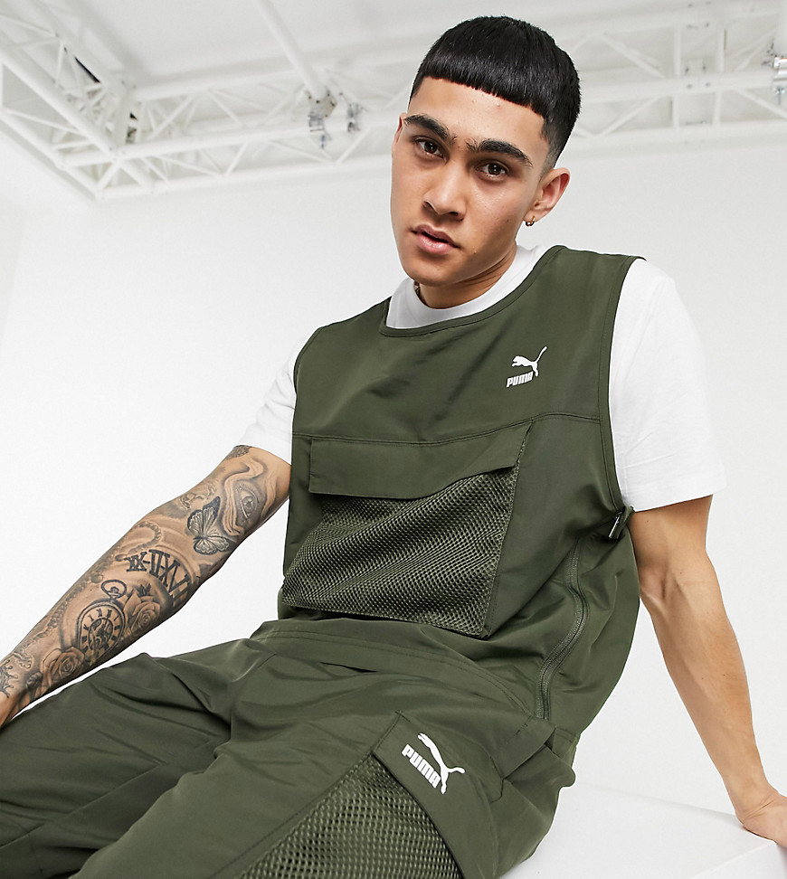 Puma Avenir chest pocket vest in khaki exclusive to ASOS-Green