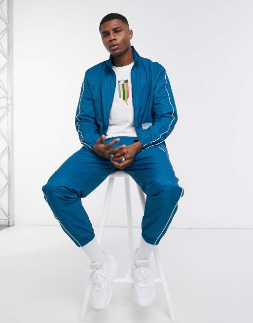 Puma Avenir woven track jacket in blue | ASOS