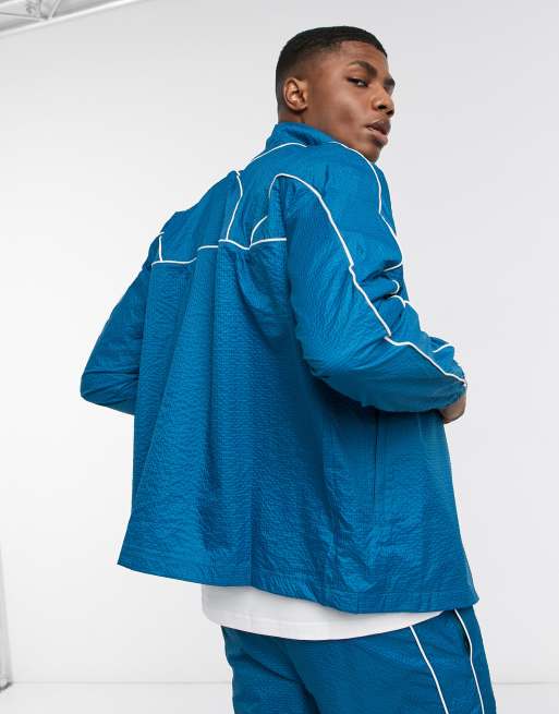 Puma Avenir woven track jacket in blue