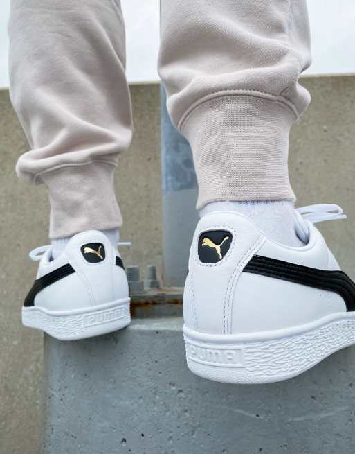 Puma Basket Classic trainers in white and black