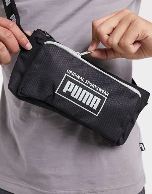 Puma bum bag in black with taping strap