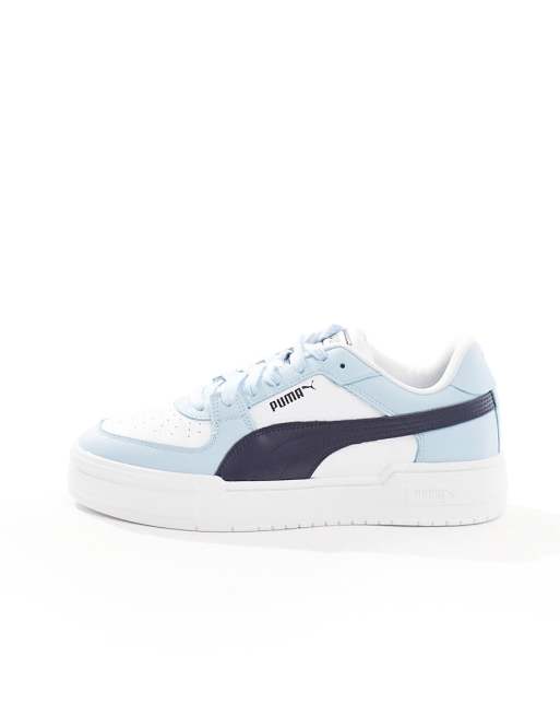 Puma Cali Sport sneakers in white and petrol blue