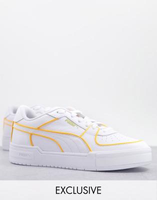 puma white and orange trainers