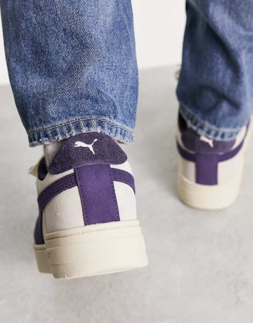 Purple and deals white pumas