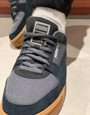 puma nere con suola marrone