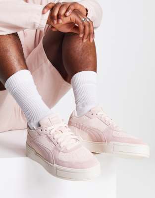 Pink pumas with gold hot sale writing