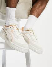 puma ca pro sneakers in white and baby blue