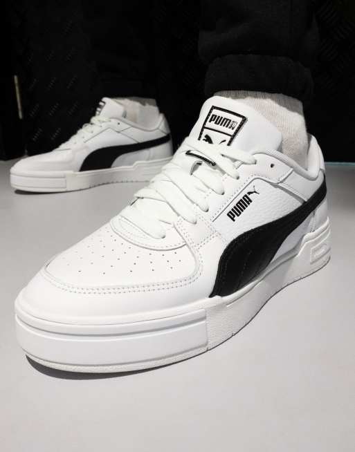 Puma black and white on sale trainers