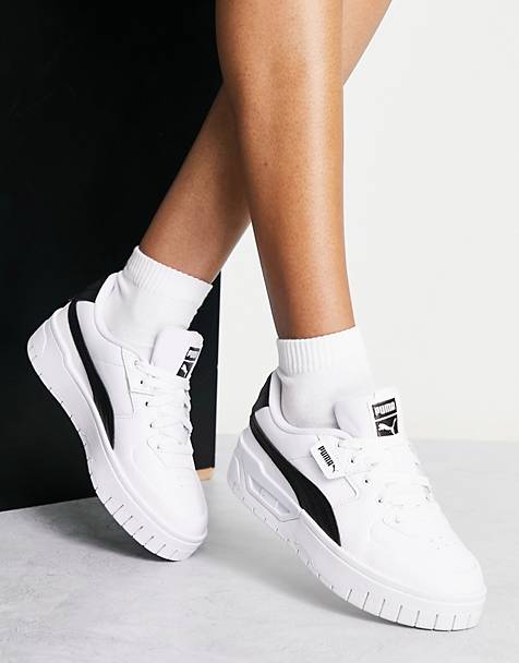 PUMA Cali Dream sneakers in white and black