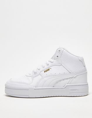 Puma Cali Pro Mid trainers in white and gold