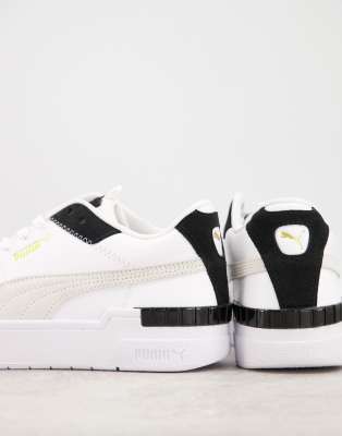 puma cali sport chunky trainers in white and black