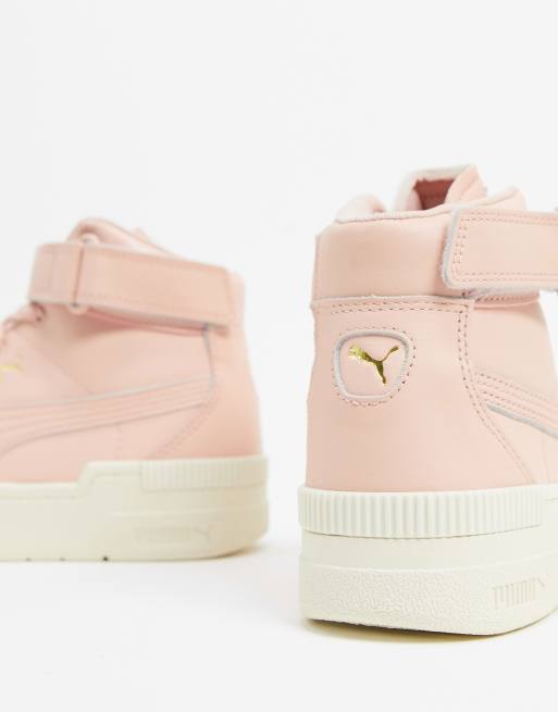 Pink pumas high top sale