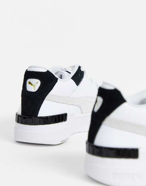 Puma Cali Sport sneakers in white and black