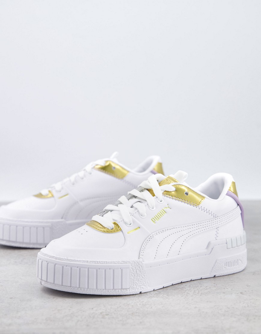 Puma Cali Sport sneakers in white and gold