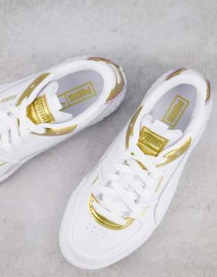 white puma shoes with gold