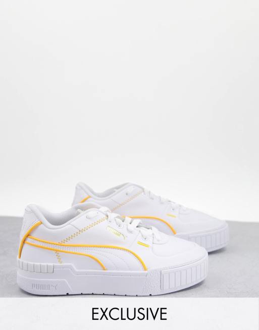 Puma Cali Sport sneakers in white with neon orange piping Exclusive to ASOS