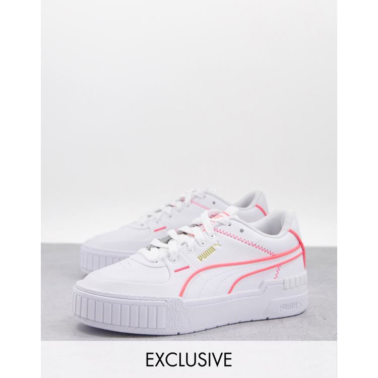 Puma Cali Sport sneakers in white with neon pink piping exclusive to ASOS ASOS