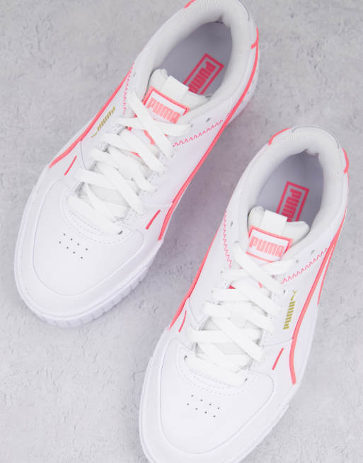 Puma Cali Sport sneakers in white with neon pink piping exclusive to ASOS