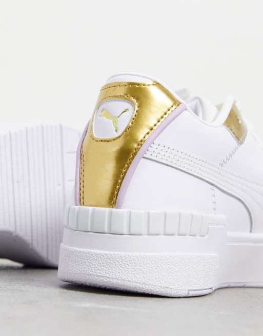 White and cheap gold trainers