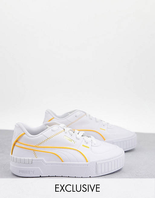 Puma Cali Sport trainers in white with neon orange piping - exclusive to asos